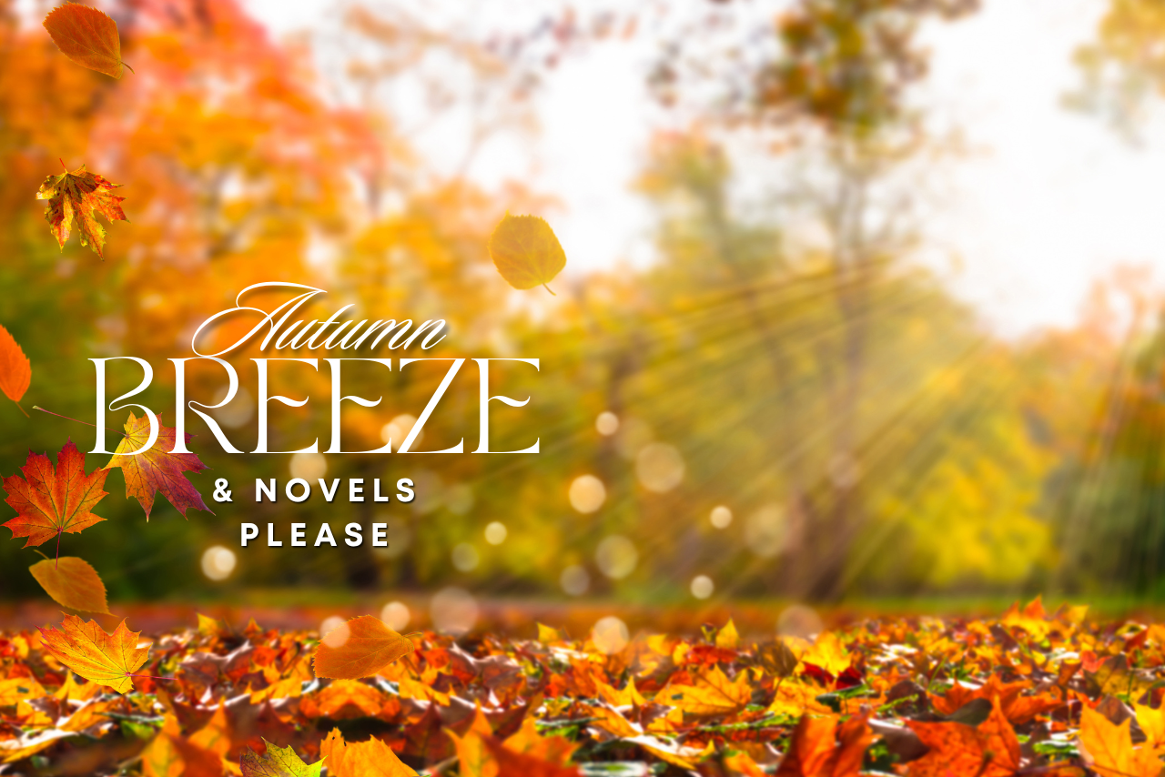 Sunny Fall day with leaves scattered on the ground and blowing in the breeze