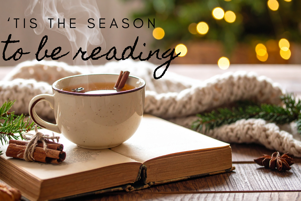 cup of tea resting on an open book
